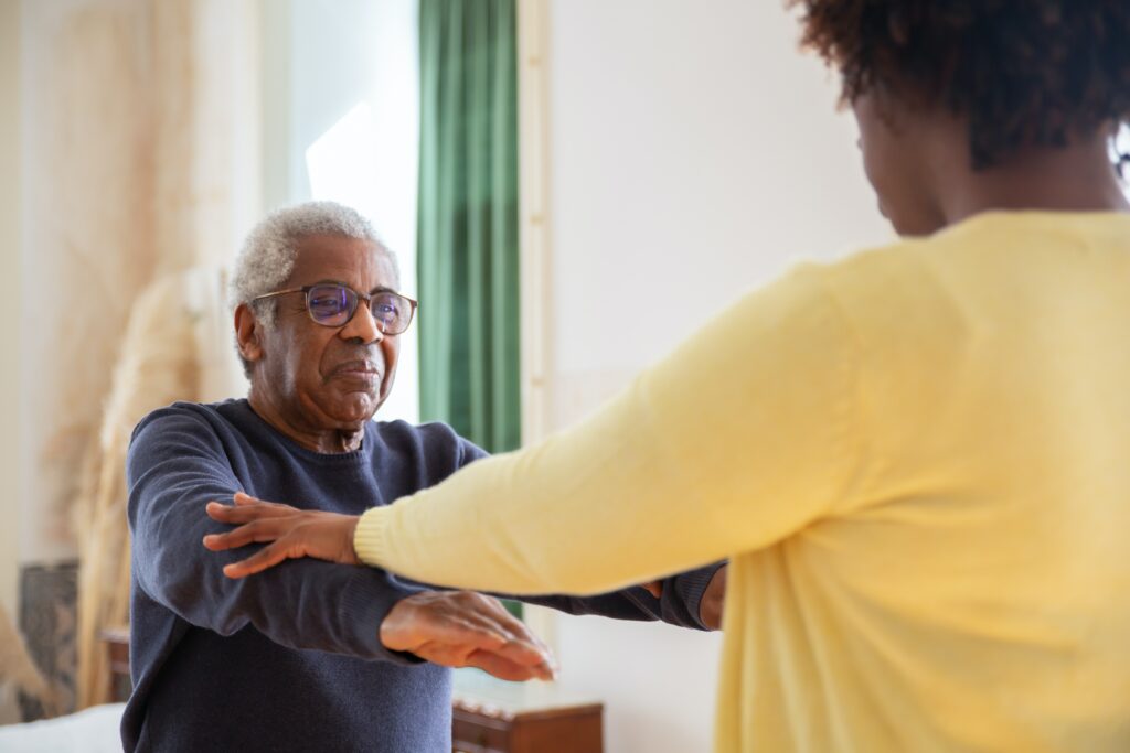 woman doing exercises with man